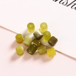 Macro shot of 6mm polished natural stone cylinder beads for DIY jewelry making