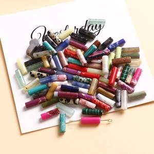 Assorted colorful cylindrical natural stone beads with marble textures for DIY jewelry