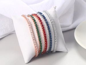Detailed view of 4mm square-cut zircon tennis bracelets in five assorted gemstone colors