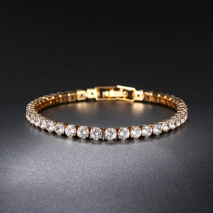 Klassisches Tennisarmband aus Gold mit runden Zirkonia Steinen und Faltverschluss