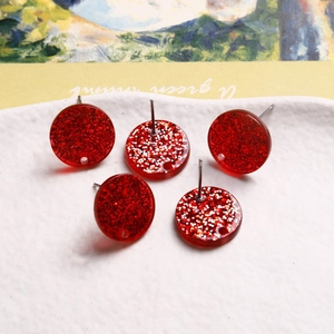 Acrylic glitter red heart stud earrings with sparkling finish and metal pins
