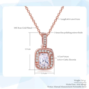 Macro detail of square zircon pendant with 18K rose gold plating and double-layer design