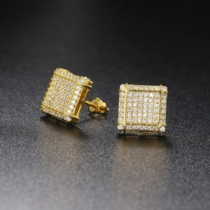 Macro detail of gold hip hop stud earrings showing full micro-pave cubic zirconia and screw-back