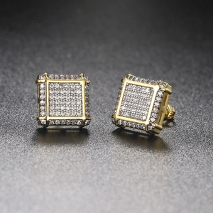 Macro shot of gold square hip hop stud earrings with micro-pave cubic zirconia