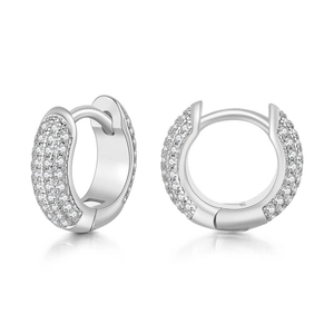 Macro shot of silver huggie earrings with four rows of micro-pave white zircon stones