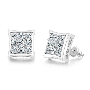 Macro shot of silver hip-hop square stud earrings featuring luxury pave cubic zirconia