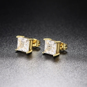 Close-up of square gold stud earrings with four-prong set sparkling zircon stones