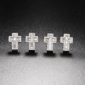 Hip hop style silver cross stud earrings with sparkling pavé and baguette zircons