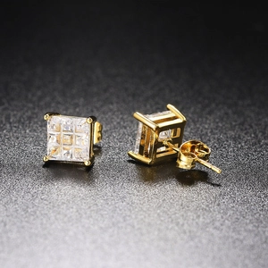 Detail of square zircon stud earrings with four-prong gold plating and butterfly back