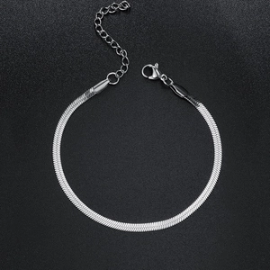 Close-up of silver stainless steel flat snake chain with lobster clasp and texture