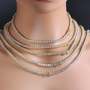 Gold plated tennis necklaces with cubic zirconia in multiple lengths on a model