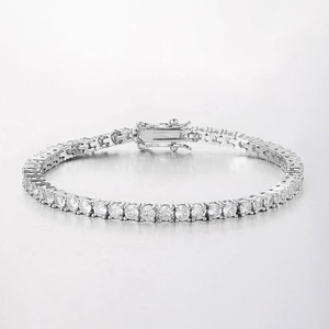 Detailed close-up of a silver tennis bracelet with brilliant-cut round cubic zirconia stones