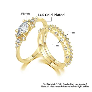 Detail of 14K gold plated ring set with marquise and pavé zircon stones and 3.30g weight