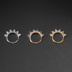 Three-piece set of crown-shaped piercing studs in silver, rose gold, and gold colors