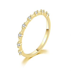 Macro shot of 18K gold plated ring featuring seven round zircon stones in prong setting