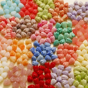 Macro shot of colorful tulip flower beads with fine petal texture for DIY jewelry making