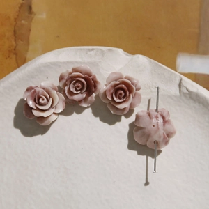 Detailed view of 16mm rose flower beads with pink and white gradient for DIY jewelry