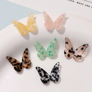 Set of 6 colorful acetate butterfly pendants in leopard and marble patterns for DIY jewelry