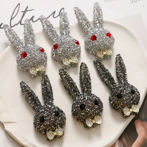 French bow tie rabbit brooches with sparkling rhinestones in silver and gunmetal gray
