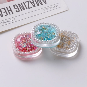 Three square resin charms with pearl borders, colorful glitter and gold leaf flakes
