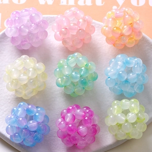 Macro shot of 32mm colorful acrylic hollow woven balls for DIY jewelry accessories
