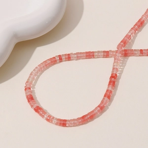 Detail of pink and white heishi beads for jewelry making necklaces and bracelets