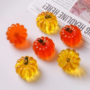 Creative pumpkin resin charms with metal loops in translucent warm autumn tones