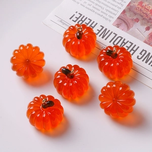 Set of six orange translucent pumpkin resin charms with gold rings for DIY jewelry making