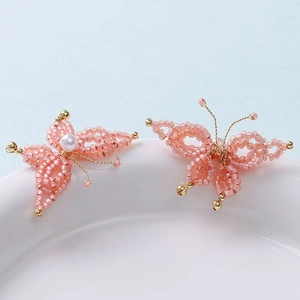 Pink crystal butterfly earrings with pearl tassel and gold wire handmade design