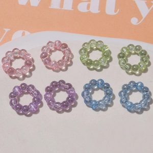 Anelli in perle acriliche macaron in rosa, verde, viola e blu per gioielli fai-da-te