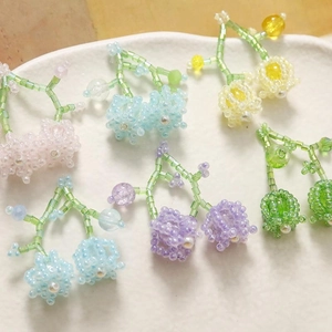 Detailed view of colorful handcrafted lily of the valley beaded jewelry accessories