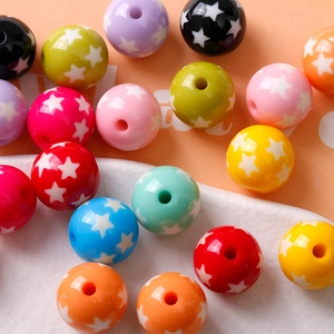 Macro detail of colorful 16mm resin star beads for DIY jewelry and bracelet making