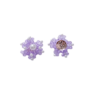 Elegant purple beaded crystal flower with a central pearl and golden metal base