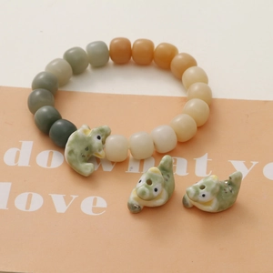 Handmade ceramic green crocodile beaded bracelet with adjustable gradient beads and charms