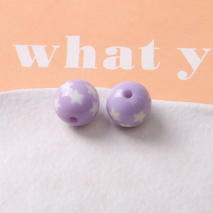 Detailed view of 16mm purple resin star beads for handmade jewelry DIY projects