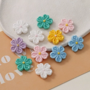 Colorful five-petal resin flower charms in macaron tones for DIY jewelry and crafts