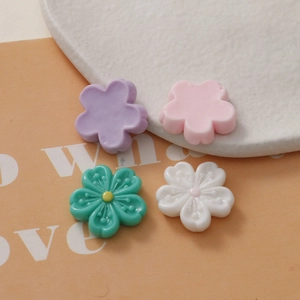 Glossy cherry blossom resin flowers in pastel colors for DIY phone cases and jewelry