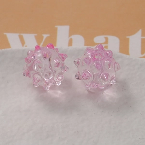Macro view of pink translucent sea urchin beads for DIY jewelry making accessories