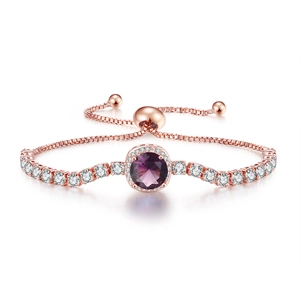 Detail view of rose gold adjustable bracelet with round purple gemstone and white zircon stones