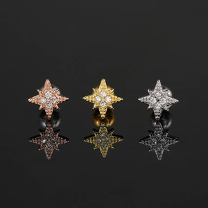 Pendientes de estrella con circonitas en oro rosa, oro y plata con incrustación de cristal