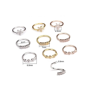 Minimalist flower nose ring set with cubic zirconia in gold silver and rose gold finishes