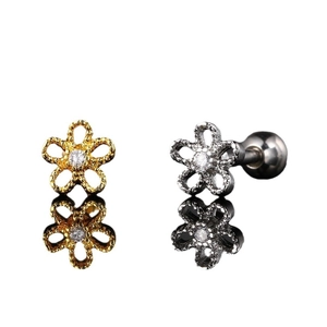 Pendientes de flores de acero inoxidable con circonita en acabados dorado y plateado