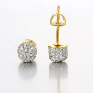 Macro detail of hip hop men's micro pave zirconia iced out screw-back stud earrings
