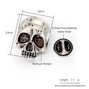 Gothic punk skull brooch in silver finish with dimensions 2.9cm x 1.8cm on white background