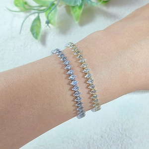 Bracciale tennis scintillante in finitura oro e argento con pietre di zircone regolabili