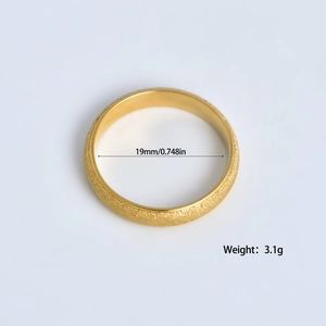Golden matte stainless steel ring with frosted finish and polished inner band for couples