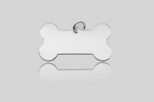Detailed view of bone-shaped polished stainless steel pet ID tag with a silver finish