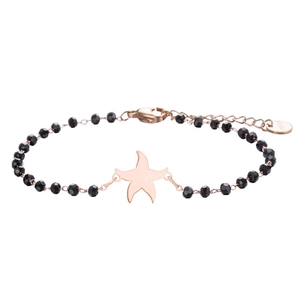 Detail of rose gold starfish charm on black faceted beaded bracelet with lobster clasp
