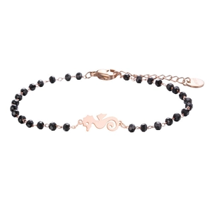 Macro shot of rose gold seahorse charm on black faceted beaded bracelet with lobster clasp