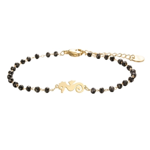 Detail of beaded black bracelet featuring a golden seahorse charm and lobster clasp